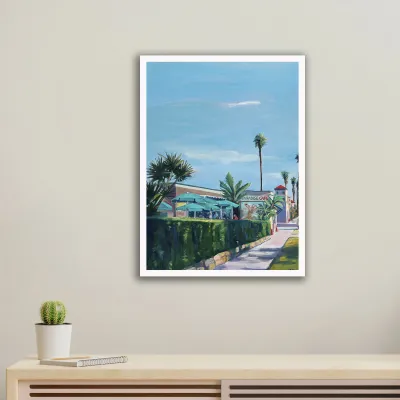 Paradise: A palm-lined street, shown framed on a wall, giclée print by Michele Zuzalek